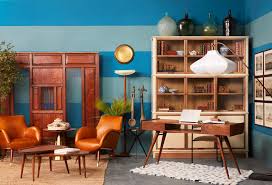 Another living room library design idea is to take advantage of an awkward space by installing bookshelves at one of the room. Living Room Library Design Ideas With The Colour Of The Year Beautiful Homes