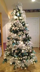100 Festive Christmas Tree Ideas That Ll Make The Christmas Cheer Even More Vibrant Blue Christmas Tree Decorations Blue Christmas Tree Cool Christmas Trees