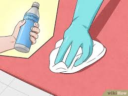 Hilangkan bau air kencing dengan menggunakan pembersih yang diperbuat daripada cuka putih. 3 Cara Untuk Menghilangkan Bau Air Seni Kucing Wikihow