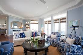 Famed for its timeless elegance and universal appeal, a white color scheme on any interiors is a safe and sure way to create a design that will turn heads and leave a lasting impression. Blue And White Living Room