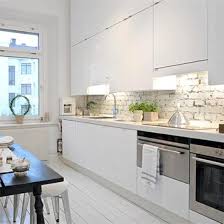 Brick walls in the kitchen create a cozy, inviting ambiance and offer a beautiful backdrop that still lets the various elements in the room shine through. 25 Modern Kitchens And Interior Brick Wall Design Ideas