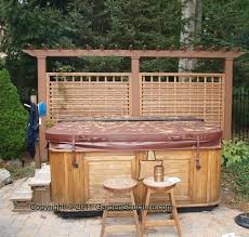 Covered hot tub with privacy screen fence and stainless steel bar top. 35 Wood Fence Designs And Fence Ideas Wood Fence Plans And Details Hot Tub Backyard Hot Tub Privacy Hot Tub Outdoor