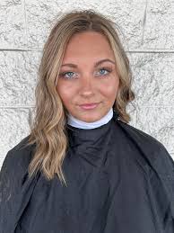 Cosmetology students' college acceptances celebrated