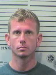 Son accused of beating mother after dispute over guns