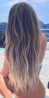 Pin By Rachel Vroman On Hair Surfer Hair Sun Bleached Hair Brown Beach Hair