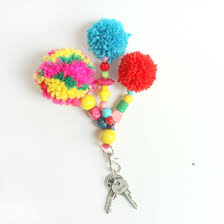 They add a cutesy touch to any handbag or keys. Simple Keychain Pom Poms Craftgawker