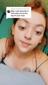 What Does Two Dots Tattooed Mean