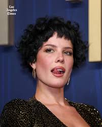 When Elle Fanning was around 14 or 15 years old, she had a cork board in  her bedroom adorned with pictures she had printed out from the internet.  There were a lot