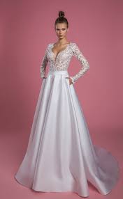 There's an art to elegance. Long Sleeve V Neck A Line Wedding Dress With Lace Bodice And Satin Skirt Kleinfeld Bridal