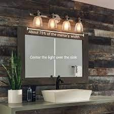 The antiqued metallic finish coordinates with popular faucet and bath hardware styles. How To Choose The Right Size Lighting Fixture Lightsonline Com Simple Bathroom Bathroom Vanity Lighting Vanity Lighting