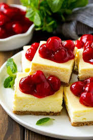 I am looking for help coming up with a dessert that is tasty but low in calories. Cherry Cheesecake Bars The Recipe Critic