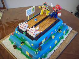 Birthday express knows how wild and energetic kids can be, which is why they have a selection of super mario activities already prepared to help your birthday party go off without a hitch. Super Mario Bowling Cake Children S Birthday Cakes Bowling Cake Bowling Birthday Cakes Mario Birthday Cake