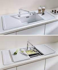 Stack it on your other kitchen tools in your cupboard or place it standing up on the side. Cutting Board Kitchen Sink Covers Designs Ideas On Dornob