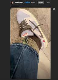 The playstation logo on one sole of the shoes. Livestream Travis Scott S Playstation 5 Unboxing Event Complex