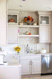 Above the counter top, the lazy susan is a great place to store boxed or canned food and spices. Jessica Merchant Of How Sweet Eats Shares Her Weeknight Dinner Strategy Kitchen Floating Shelves Kitchen Wall Decor Kitchen Inspirations