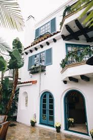 Black And White Spanish Style Home Exterior Mediterranean Villa Inspired By This Mediterranean Homes Exterior House Colors Spanish Style Homes