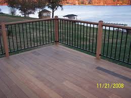 Charming Brown Wooden Deck In Cheap Trex Decking Cost Matched With Brown Black Railing For Patio Decor Ideas Building A Deck Deck Cost Deck Remodel