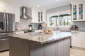 Two tone painted kitchen cabinet ideas.reserve a weekend or two with family and friends and have a painting party. It S Hard To Beat A Good Two Toned Kitchen We Love This Gray And White Combo Grey Subway Tiles Kitchen Remodel Small Gray Subway Tile Backsplash