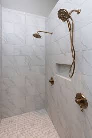Gold is making a major comeback in home design. 14 Bathroom Champagne Bronze Gold Fixtures White Cabinets Ideas Bathroom Design Gold Fixtures Beautiful Bathrooms
