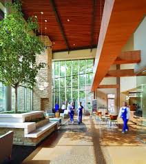 Green Design And Architecture Are Used To Build A Leed Certified Rural Hospital Healthcare Architecture Hospital Architecture Hospital Interior Design