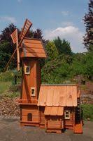 Windmuhle Mit Integrierter Wassermuhle In 2020 Windmuhle Muhle Wasserrad