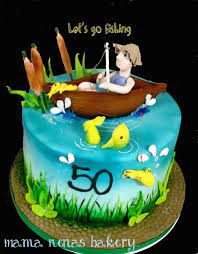 Handpainted sugar fish swim around the sides and an edible life preserver hangs on a piling. Fishing Theme Cake Birthday Cakes Fishing Theme Cake Fish Cake Birthday Themed Cakes