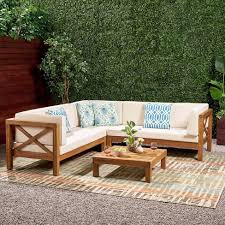 The patio furniture sets have 1 double sofa with cushion, 2 single sofas with cushions, and 1 table with tempered glass. Brava 4pc Wood Patio Chat Set W Cushions Christopher Knight Home Target