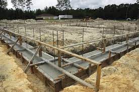 The final height of the foundation should be at least 4″ above grade. Building Code Foundation Requirements