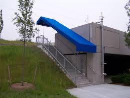 The first section of the staircase rises to a lower landing, turning right underneath the chimney stack and left into a new staircase rising to the upper floor. Stairway Awning Gallery L F Pease Company