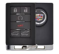 Remove the original key from the ignition cylinder. 2008 Cadillac Escalade Remote Keyless Entry Key Fob 22756465 20965647 Ouc6000223