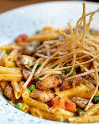 Spicy chicken chipotle pasta from the cheesecake factory with asparagus, bell peppers and peas with honey glazed chicken in a spicy chipotle parmesan cream sauce. The Cheesecake Factory Middle East Ù…Ø®Ø·Ø·Ø§Øª Ø§Ù„ÙŠÙˆÙ… Ø¹Ù„Ù‰ Ù‡ÙŠØ¦Ø© Ø¨Ø§Ø³ØªØ§ Ø¯Ø¬Ø§Ø¬ Ø§Ù„Ø´ÙŠØ¨ÙˆØªÙ„ÙŠ Ø§Ù„Ø­Ø§Ø± You Re Pasta Point Of No Return Once You Start Digging Into Our Spicy Chicken Chipotle Pasta