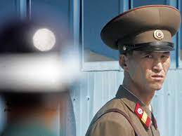 North Korean Soldier Looks At South Korean North Korea North Korean Korea
