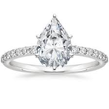 Tw.) this sparkling halo setting features beautiful scalloped pavé diamonds that encircle the center gem and adorn the gently tapering band. Pear Shaped Diamond Engagement Rings Brilliant Earth