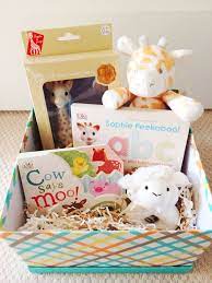This Sweet Animal Themed Gift Basket Is Perfect For A Baby Shower Gender Announcement Or New Baby Gift Baby Gift Basket Baby Shower Crafts Giraffe Baby Gifts
