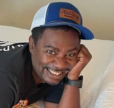 Why does the A/C stop blowing cold air when the 2020 Chevy Express 3500 is  idling in hot weather?