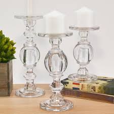 Just relax and keep a few extra on hand so you can forget about it! Set Of 3 Baluster Glass Pillar And Taper Candlestick Holders