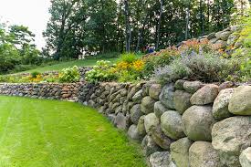 Rogers landscape has installed hundreds of linear feet of retaining walls over the years. Retaining And Boulder Walls Michigan Landscape Professionals
