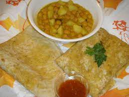 Dhalpourie Roti With Curry Channa And Aloo Eat As A Wrap Or Pinch And Scoop Also Available With Curry Chicken Or Curry Shri Trini Food Food Authentic Recipes