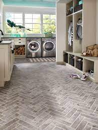The waterproof planks are constructed with four layers and contain a waterproof core built to withstand spills and splashes. Modern Vinyl Flooring For Bathrooms Vinyl Flooring Bathroom Modern Vinyl Flooring Vinyl Flooring