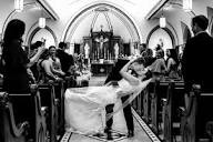 Dip with kiss in church aisle, photo by SMJ Photography