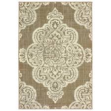 Purchased this 2x8ft rug in navy to help catch the water drips from the new laminate flooring in my kitchen. Averley Home Sienna Medallion Tan Ivory 8 Ft 6 In X 13 Ft Indoor Outdoor Area Rug 821759 The Home Depot