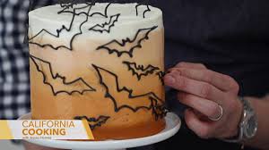 Preppy Kitchen S John Kanell Demonstrates How To Make A Halloween Themed Bat Cake Preppy Kitchen Bat Cake Pumpkin Buttercream