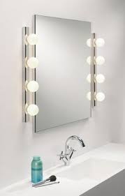 Flank the bathroom mirror with lights. 29 Mirror Light Ideas Bathroom Design Modern Bathroom Bathroom Inspiration
