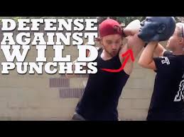 In short, a haymaker is a very wide and predictable punch with a lot of power behind it. Defense Against Wild Haymaker Punches In A Fight Self Defense Martial Arts Martial Arts Martial Arts Techniques