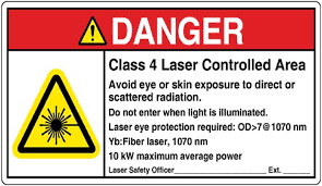 Laboratory hazard signs are a range of hazard warning message signs used for being mounted around laboratories with the intention of warning laboratory staff about the risks and dangers from hazards associated with equipment, liquids and materials which are stored and used in laboratory environments such as caustics and chemicals.staff who work in laboratories must wear protective clothing. Laser Safety Sign Changes Cause Confusion Lasers In Use May 2017 Photonics Spectra