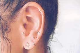 This Ear Piercing Trend Is About To Be Everywhere Earings Piercings Earring Trends Constellation Piercings
