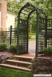 Yorktown fence and spindle top arbor. Pin By Joann Armato On Patio And Plants Garden Gates And Fencing Garden Entrance Home Landscaping