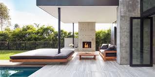 This contemporary patio design is a great place for entertaining, featuring a fire pit area surrounded by bench seating, accented by lush landscape. 25 Outdoor Fireplace Ideas Outdoor Fireplaces Fire Pits