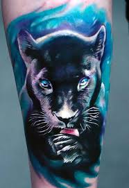 Realistic panther tattoos are in black and grey colors which express the feeling of the tattoo wearer. Beautiful Black Panther On The Arm Style Realistic Tags Beautiful Awesome Panther Tattoo Black Panther Tattoo Animal Tattoos