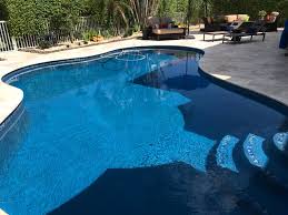 (on top of concrete) like said above mud/glue the outside pavers down and then sand over the rest of concrete and lay pavers. Choosing Between Travertine And Brick Pavers For Your Pool Deck All Seal Exteriors